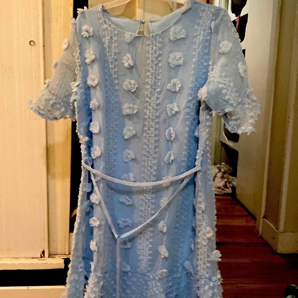 It’s M women’s beautiful light blue Dress with a soft unique detailing all over